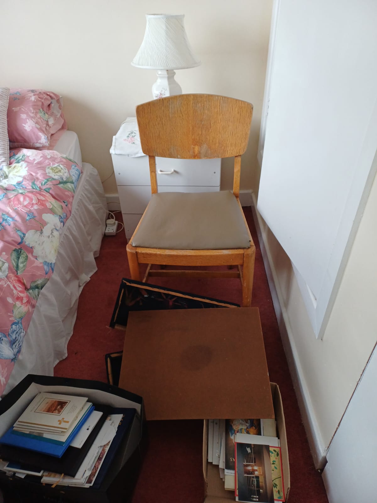 Old furniture and belongings ready for junk removal in a Dublin bedroom