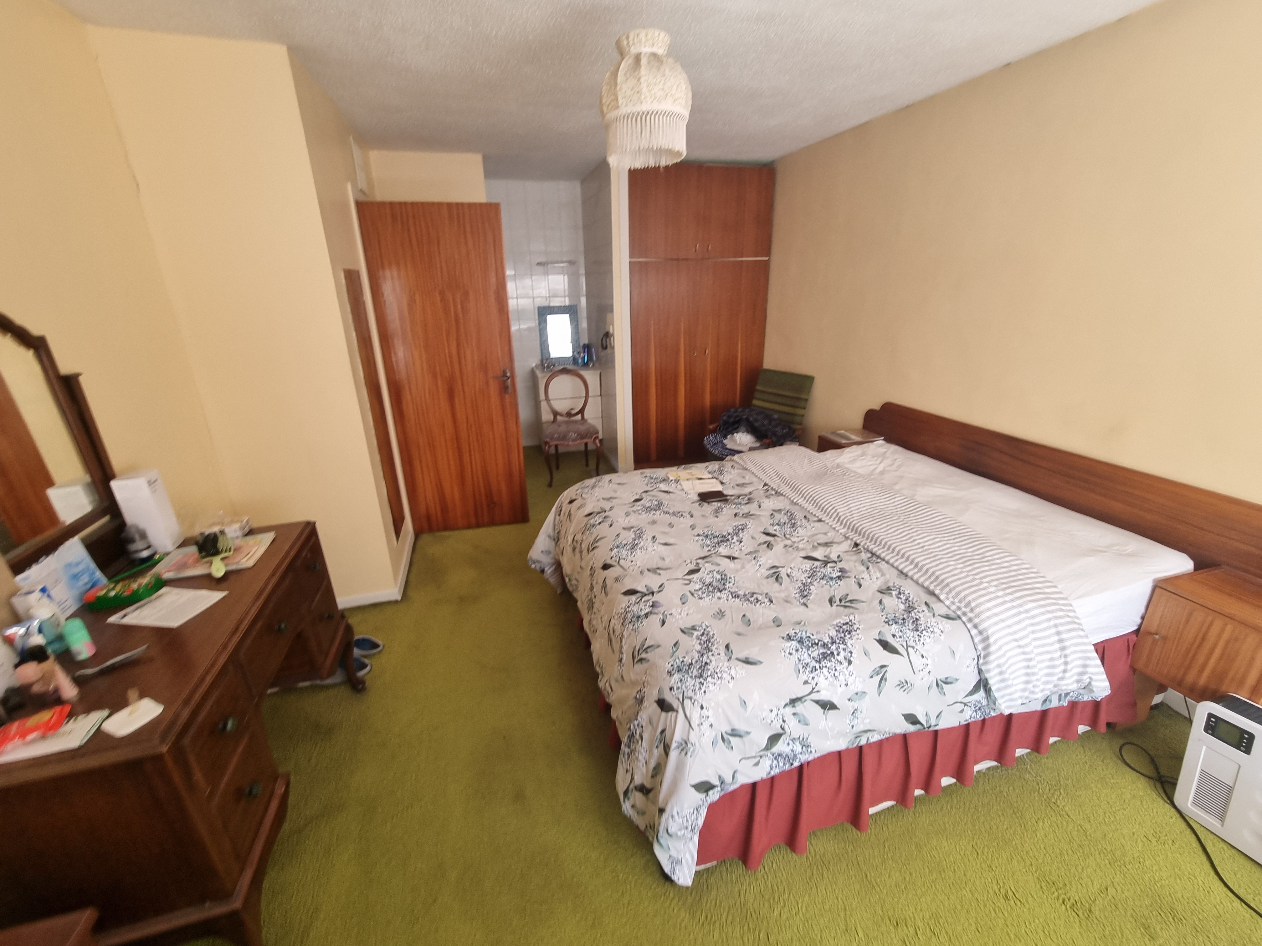A bedroom cleared with care during a bereavement clearance