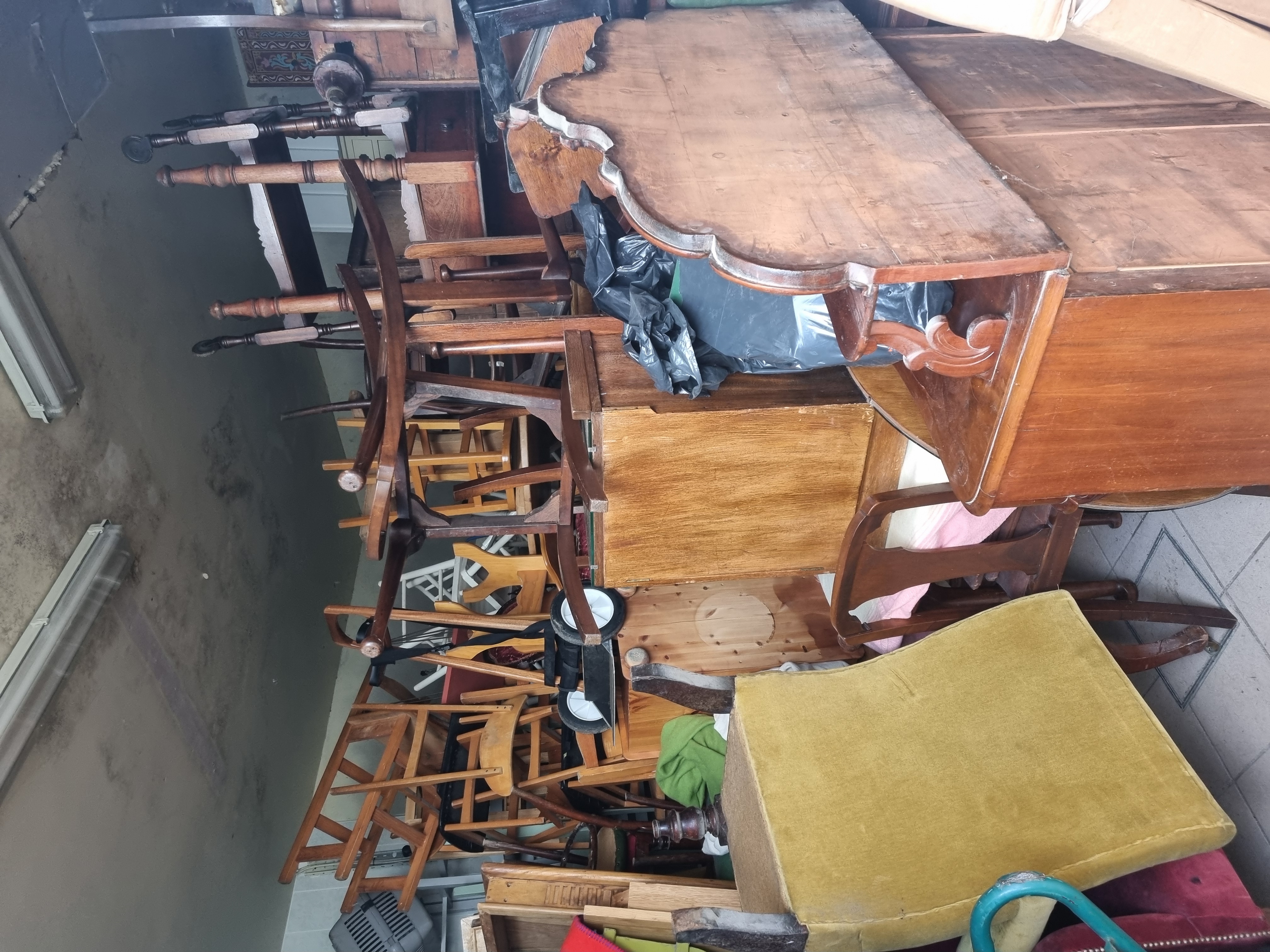 A room full of furniture cleared during a house clearance