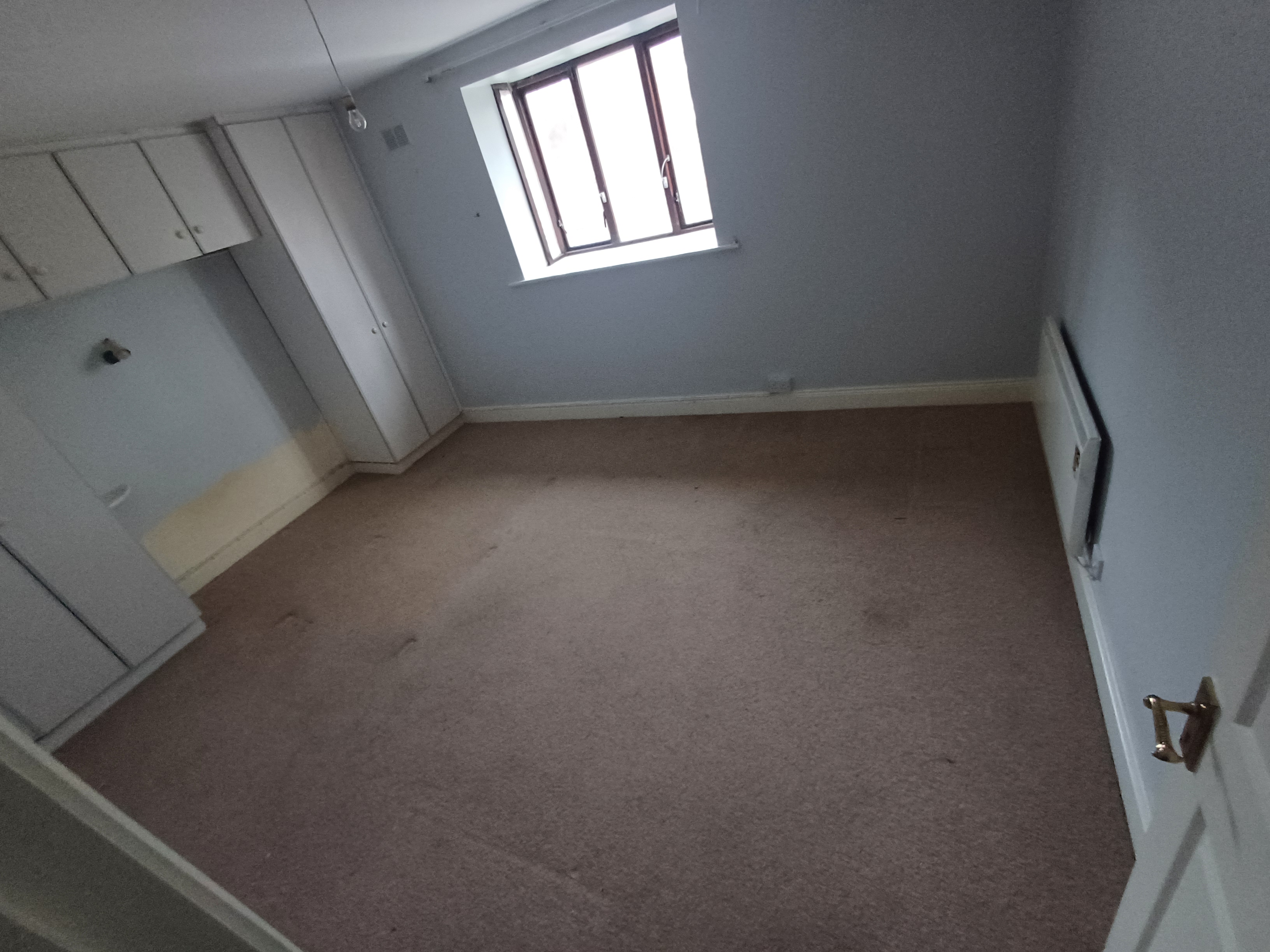 A room fully cleared and ready after a house clearance