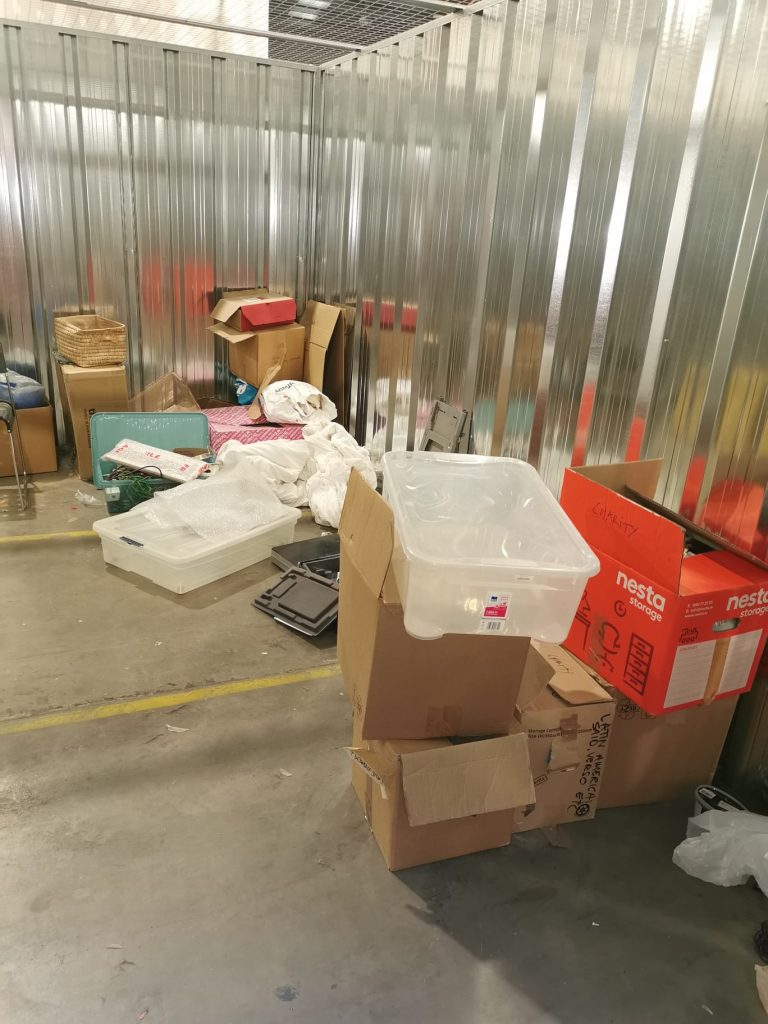 A self-storage unit in Dún Laoghaire full of boxes and belongings before clearance